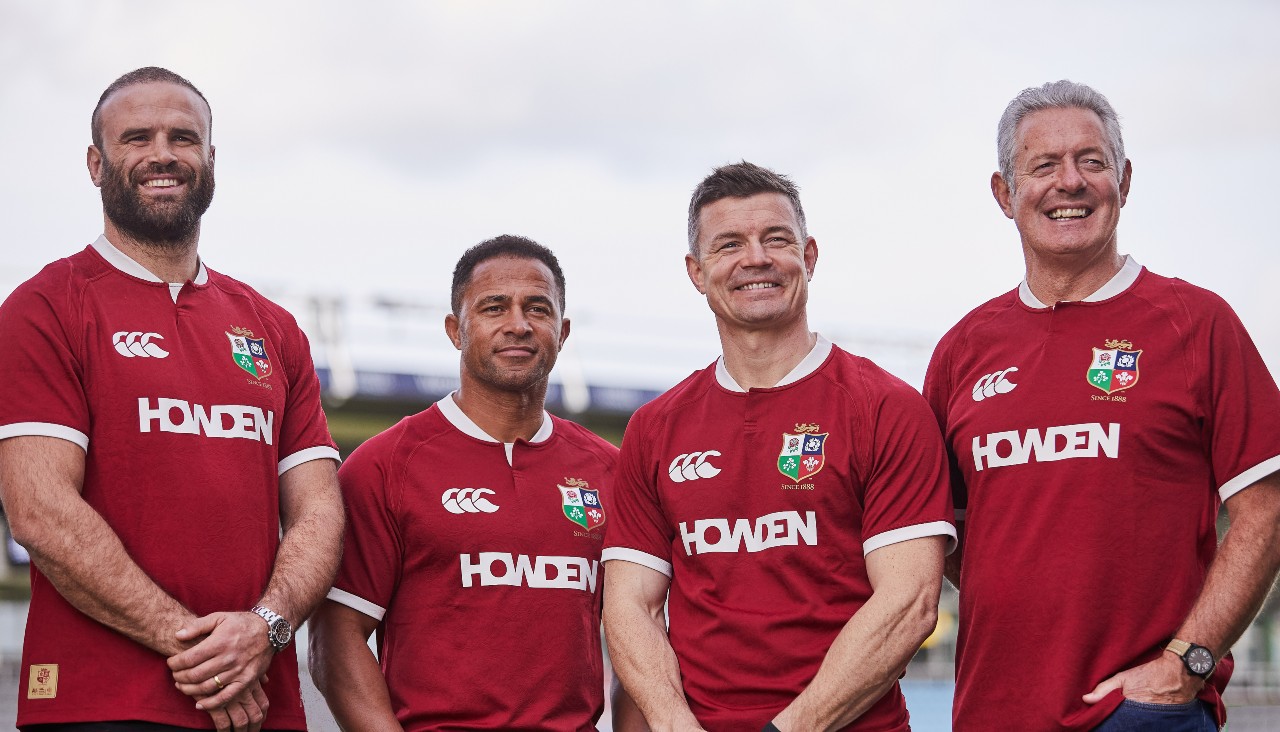 Jamie Roberts, Jason Robinson, Brian O'Driscoll, and Gavin Hastings standing and smiling